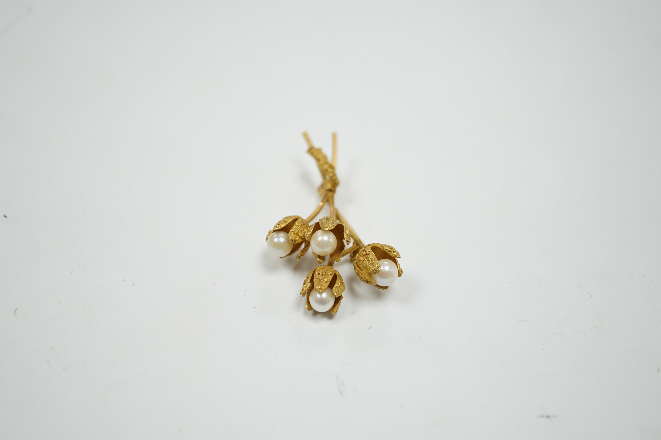 A continental 18k yellow metal and four stone cultured pearl set spray brooch, 54mm, 13.4 grams.